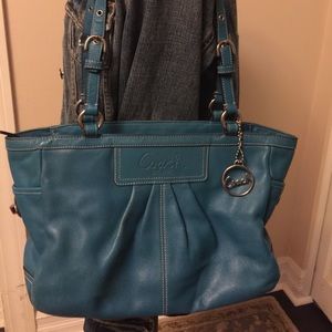 Turquoise Coach purse with zip top Good Used cond